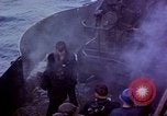 Image of CV-6 USS Enterprise aftermath of kamikaze attack Pacific Ocean, 1945, second 5 stock footage video 65675050833