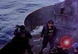 Image of CV-6 USS Enterprise aftermath of kamikaze attack Pacific Ocean, 1945, second 6 stock footage video 65675050833