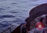 Image of CV-6 USS Enterprise aftermath of kamikaze attack Pacific Ocean, 1945, second 14 stock footage video 65675050833