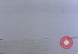 Image of CV-6 USS Enterprise aftermath of kamikaze attack Pacific Ocean, 1945, second 32 stock footage video 65675050833