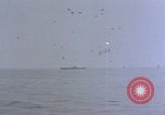 Image of CV-6 USS Enterprise aftermath of kamikaze attack Pacific Ocean, 1945, second 50 stock footage video 65675050833