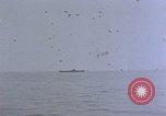Image of CV-6 USS Enterprise aftermath of kamikaze attack Pacific Ocean, 1945, second 52 stock footage video 65675050833