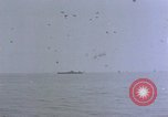 Image of CV-6 USS Enterprise aftermath of kamikaze attack Pacific Ocean, 1945, second 54 stock footage video 65675050833