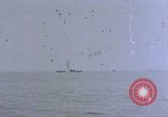 Image of CV-6 USS Enterprise aftermath of kamikaze attack Pacific Ocean, 1945, second 60 stock footage video 65675050833