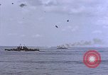 Image of USS Enterprise severely damaged by Kamikaze strike Pacific Ocean, 1945, second 4 stock footage video 65675050835