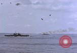Image of USS Enterprise severely damaged by Kamikaze strike Pacific Ocean, 1945, second 5 stock footage video 65675050835