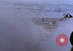 Image of USS Enterprise severely damaged by Kamikaze strike Pacific Ocean, 1945, second 16 stock footage video 65675050835