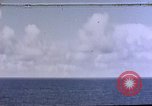Image of U.S. Navy TBF Avenger aircraft drop practice bombs on target sled Pacific Ocean, 1945, second 1 stock footage video 65675050838