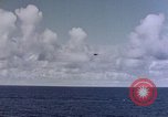 Image of U.S. Navy TBF Avenger aircraft drop practice bombs on target sled Pacific Ocean, 1945, second 4 stock footage video 65675050838