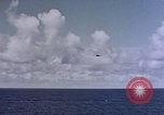 Image of U.S. Navy TBF Avenger aircraft drop practice bombs on target sled Pacific Ocean, 1945, second 5 stock footage video 65675050838