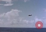 Image of U.S. Navy TBF Avenger aircraft drop practice bombs on target sled Pacific Ocean, 1945, second 11 stock footage video 65675050838