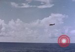 Image of U.S. Navy TBF Avenger aircraft drop practice bombs on target sled Pacific Ocean, 1945, second 12 stock footage video 65675050838