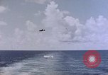 Image of U.S. Navy TBF Avenger aircraft drop practice bombs on target sled Pacific Ocean, 1945, second 15 stock footage video 65675050838
