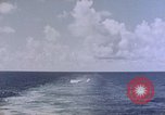 Image of U.S. Navy TBF Avenger aircraft drop practice bombs on target sled Pacific Ocean, 1945, second 17 stock footage video 65675050838