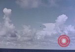Image of U.S. Navy TBF Avenger aircraft drop practice bombs on target sled Pacific Ocean, 1945, second 23 stock footage video 65675050838