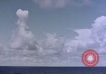 Image of U.S. Navy TBF Avenger aircraft drop practice bombs on target sled Pacific Ocean, 1945, second 25 stock footage video 65675050838