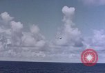 Image of U.S. Navy TBF Avenger aircraft drop practice bombs on target sled Pacific Ocean, 1945, second 26 stock footage video 65675050838