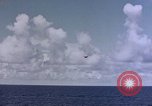 Image of U.S. Navy TBF Avenger aircraft drop practice bombs on target sled Pacific Ocean, 1945, second 28 stock footage video 65675050838
