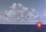 Image of U.S. Navy TBF Avenger aircraft drop practice bombs on target sled Pacific Ocean, 1945, second 29 stock footage video 65675050838