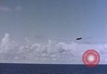 Image of U.S. Navy TBF Avenger aircraft drop practice bombs on target sled Pacific Ocean, 1945, second 31 stock footage video 65675050838