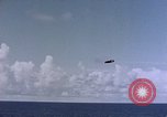 Image of U.S. Navy TBF Avenger aircraft drop practice bombs on target sled Pacific Ocean, 1945, second 32 stock footage video 65675050838