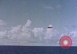 Image of U.S. Navy TBF Avenger aircraft drop practice bombs on target sled Pacific Ocean, 1945, second 33 stock footage video 65675050838