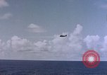 Image of U.S. Navy TBF Avenger aircraft drop practice bombs on target sled Pacific Ocean, 1945, second 34 stock footage video 65675050838