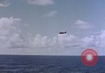 Image of U.S. Navy TBF Avenger aircraft drop practice bombs on target sled Pacific Ocean, 1945, second 35 stock footage video 65675050838