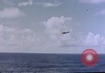 Image of U.S. Navy TBF Avenger aircraft drop practice bombs on target sled Pacific Ocean, 1945, second 36 stock footage video 65675050838