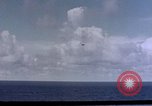 Image of U.S. Navy TBF Avenger aircraft drop practice bombs on target sled Pacific Ocean, 1945, second 40 stock footage video 65675050838
