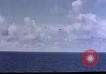 Image of U.S. Navy TBF Avenger aircraft drop practice bombs on target sled Pacific Ocean, 1945, second 42 stock footage video 65675050838