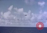 Image of U.S. Navy TBF Avenger aircraft drop practice bombs on target sled Pacific Ocean, 1945, second 44 stock footage video 65675050838