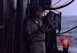 Image of U.S. Navy TBF Avenger aircraft drop practice bombs on target sled Pacific Ocean, 1945, second 47 stock footage video 65675050838