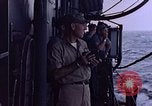Image of U.S. Navy TBF Avenger aircraft drop practice bombs on target sled Pacific Ocean, 1945, second 49 stock footage video 65675050838