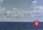 Image of U.S. Navy TBF Avenger aircraft drop practice bombs on target sled Pacific Ocean, 1945, second 50 stock footage video 65675050838