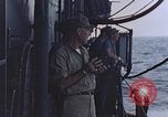 Image of U.S. Navy TBF Avenger aircraft drop practice bombs on target sled Pacific Ocean, 1945, second 53 stock footage video 65675050838