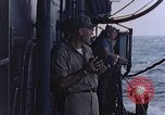 Image of U.S. Navy TBF Avenger aircraft drop practice bombs on target sled Pacific Ocean, 1945, second 54 stock footage video 65675050838