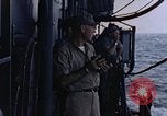 Image of U.S. Navy TBF Avenger aircraft drop practice bombs on target sled Pacific Ocean, 1945, second 56 stock footage video 65675050838