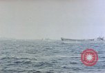 Image of U.S. Navy TBF Avenger aircraft drop practice bombs on target sled Pacific Ocean, 1945, second 59 stock footage video 65675050838