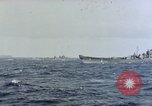 Image of U.S. Navy TBF Avenger aircraft drop practice bombs on target sled Pacific Ocean, 1945, second 61 stock footage video 65675050838