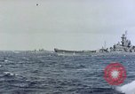 Image of U.S. Navy TBF Avenger aircraft drop practice bombs on target sled Pacific Ocean, 1945, second 62 stock footage video 65675050838
