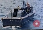 Image of motor launch Pacific Ocean, 1945, second 31 stock footage video 65675050839
