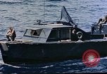 Image of motor launch Pacific Ocean, 1945, second 33 stock footage video 65675050839
