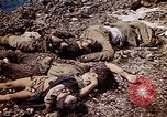 Image of dead bodies Tinian Island Mariana Islands, 1944, second 57 stock footage video 65675050848