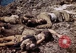 Image of dead bodies Tinian Island Mariana Islands, 1944, second 58 stock footage video 65675050848