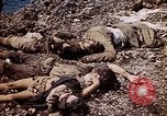 Image of dead bodies Tinian Island Mariana Islands, 1944, second 59 stock footage video 65675050848