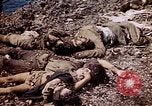 Image of dead bodies Tinian Island Mariana Islands, 1944, second 60 stock footage video 65675050848