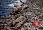 Image of dead bodies Tinian Island Mariana Islands, 1944, second 62 stock footage video 65675050848