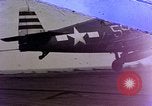 Image of F6F Hellcat aircraft on fire Pacific Ocean, 1945, second 1 stock footage video 65675050861
