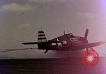 Image of F6F Hellcat aircraft on fire Pacific Ocean, 1945, second 4 stock footage video 65675050861
